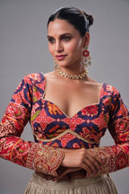 Cream and Gold Tissue Lehenga with Patola Choli and Rust Red Embroidered Dupatta