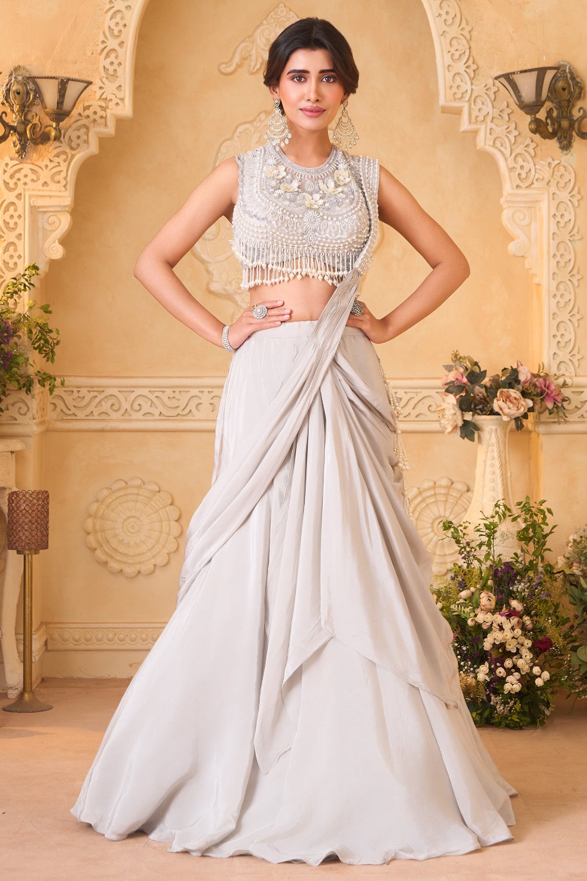 Ivory White Pre-Draped Lehenga featuring heavily Embroidered Pearl Fringe Blouse with Attached Dupatta