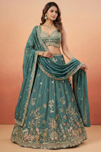 Deep Rama Tissue Lehenga Choli with Scenic Peacock & Animal Motif Embroidery