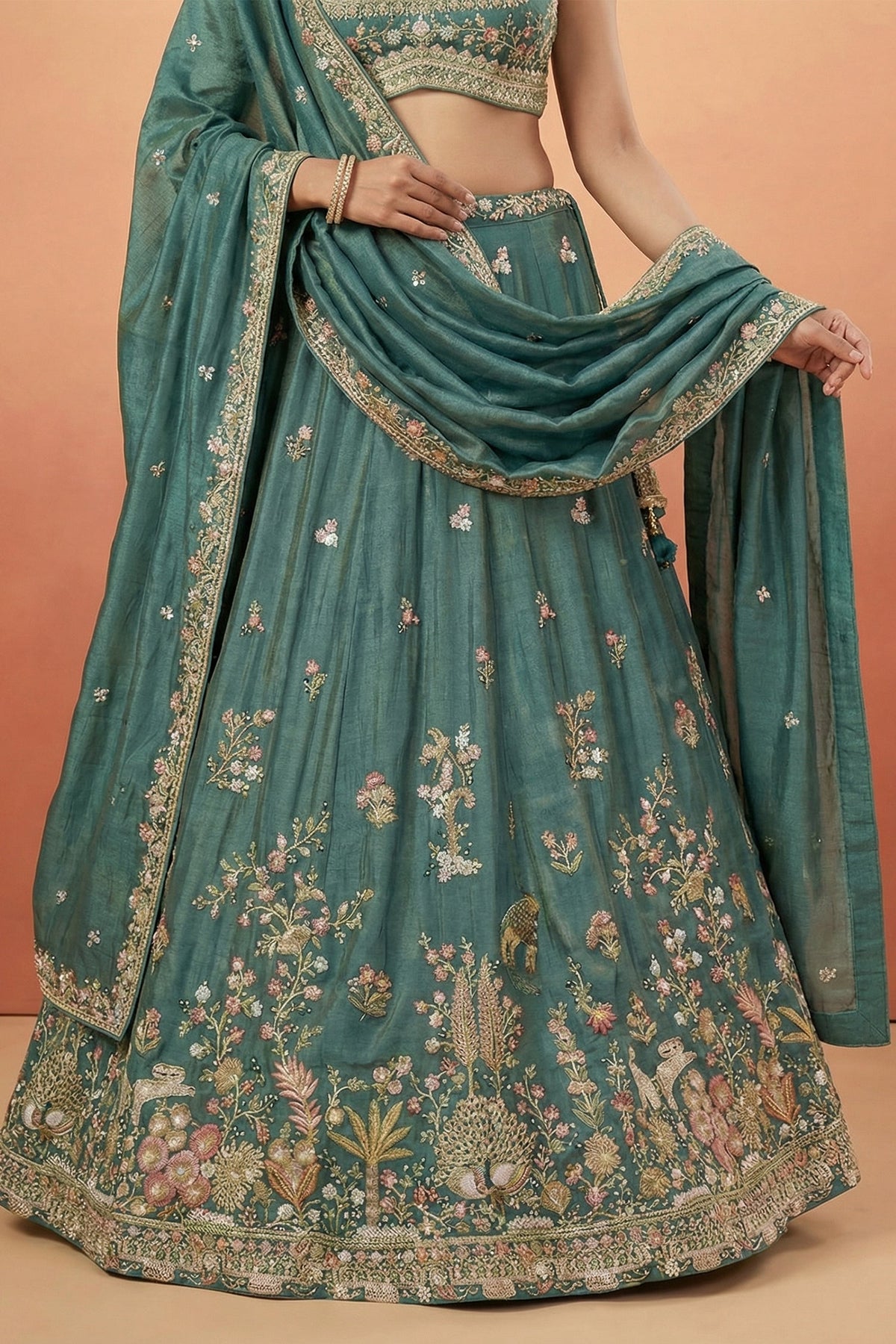 Deep Rama Tissue Lehenga Choli with Scenic Peacock & Animal Motif Embroidery