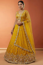 Vibrant Mustard Yellow Chinon Silk Lehenga Choli with Pearl & Sequin Woodland Motifs