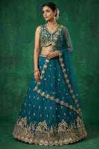 Teal Blue Tissue Lehenga Choli with Scalloped Jharokha and Peacock Embroidery