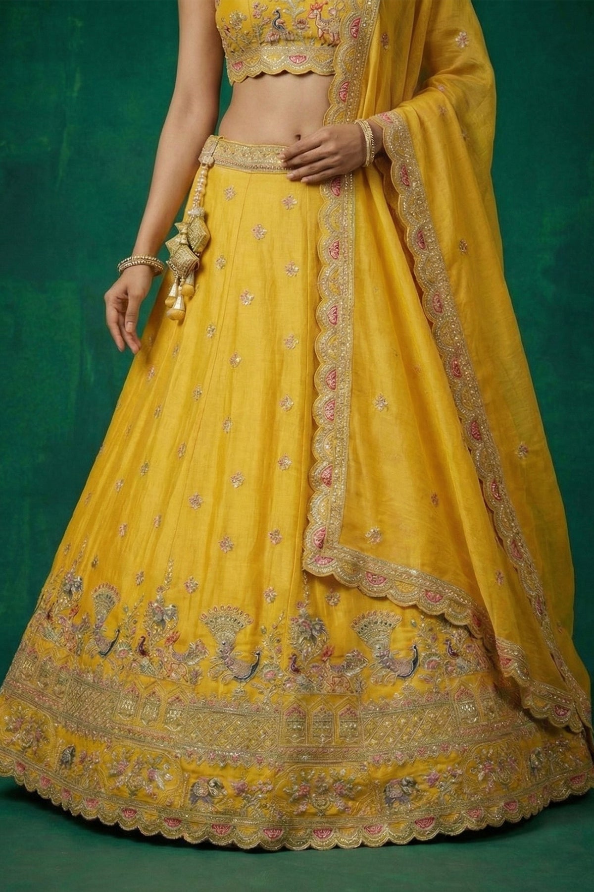 Bright Yellow Tissue Lehenga Choli with Elephant and Peacock Heritage Embroidery