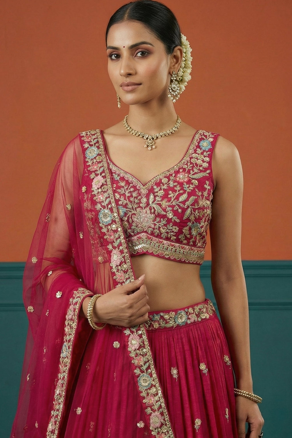 Rani Pink Pleated Georgette Lehenga Choli with Embroidered Border