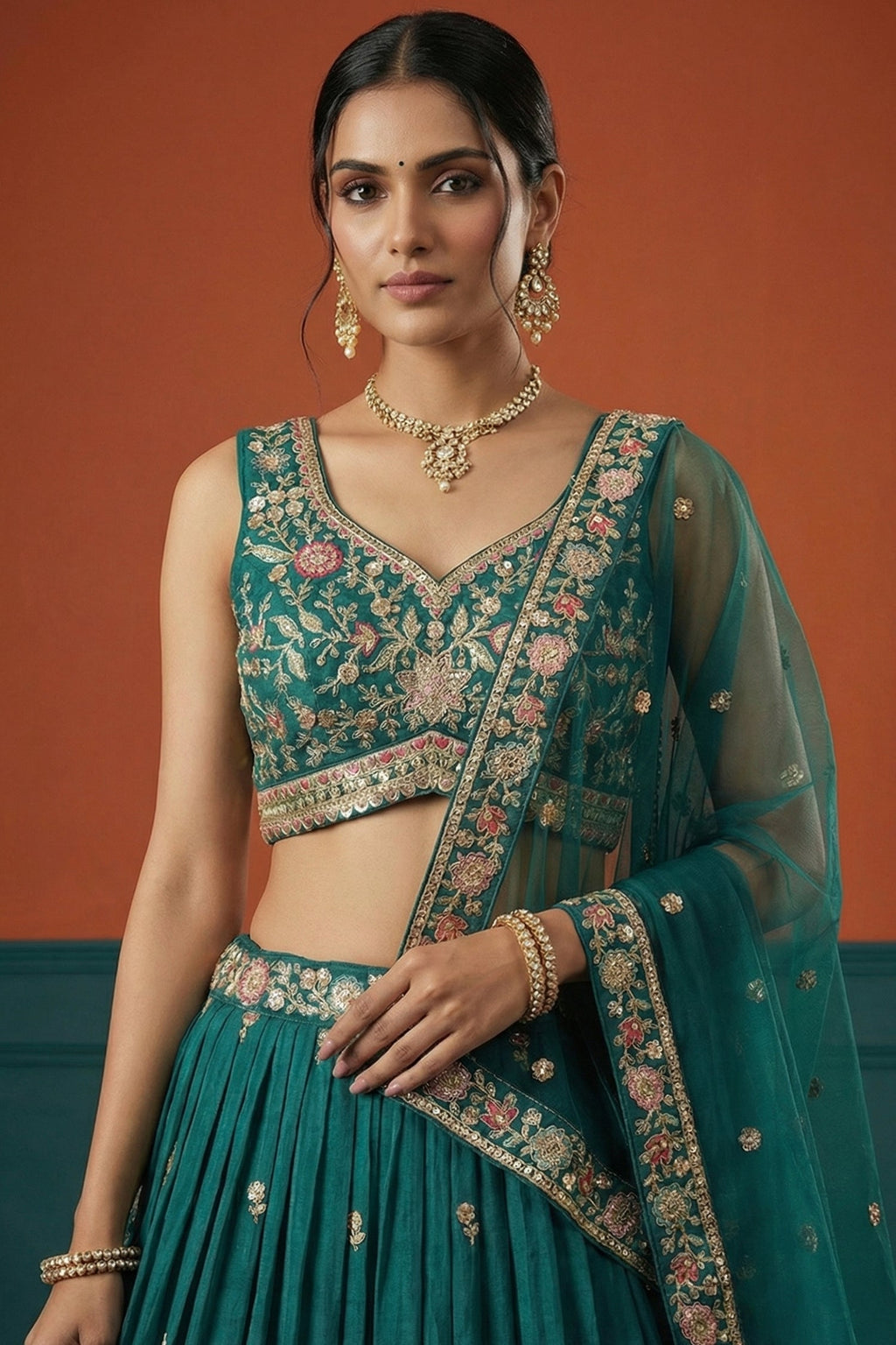 Rama Teal Pleated Georgette Lehenga Choli with Embroidered Hem