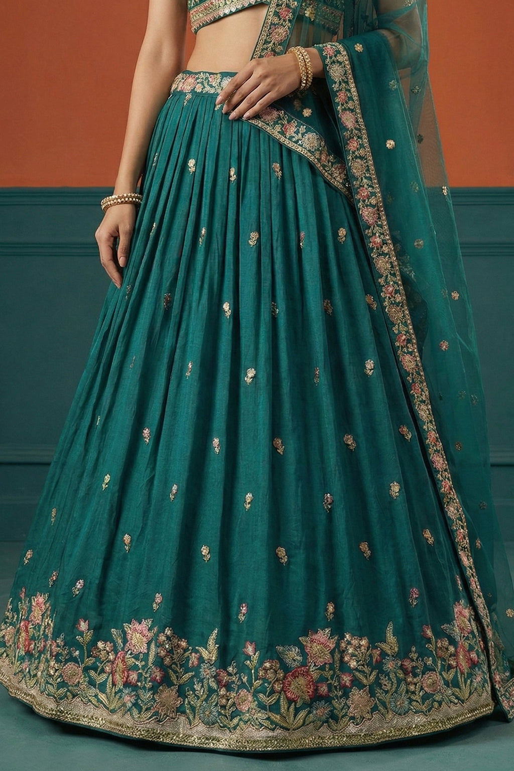 Rama Teal Pleated Georgette Lehenga Choli with Embroidered Hem
