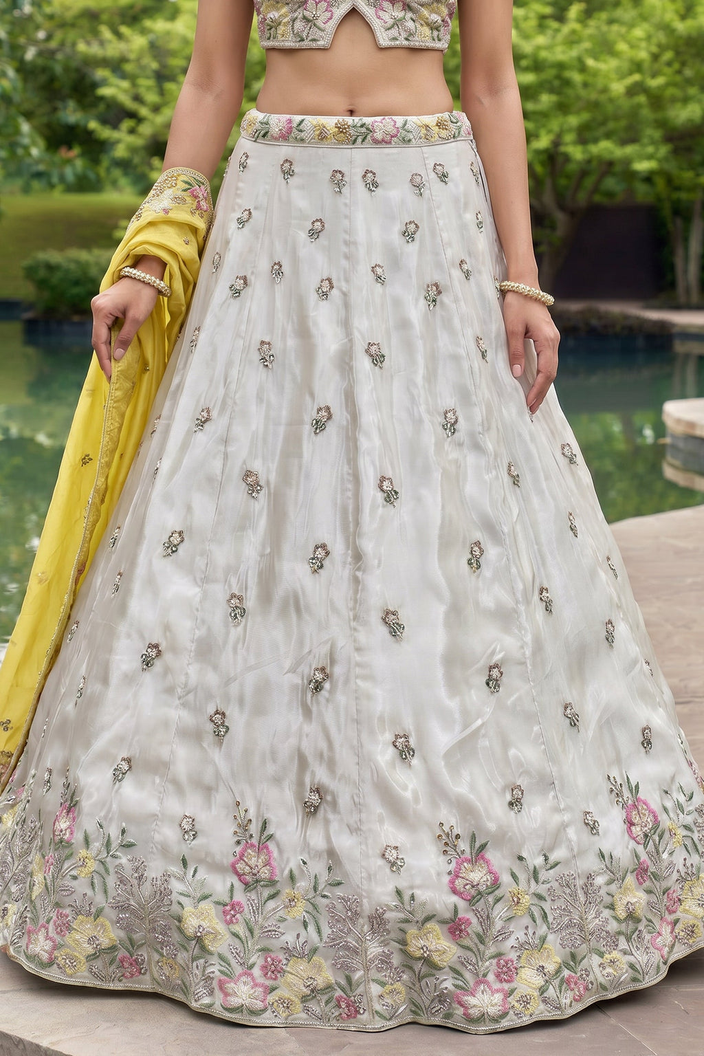 Off White Lehenga Choli with Floral Embroidered Border