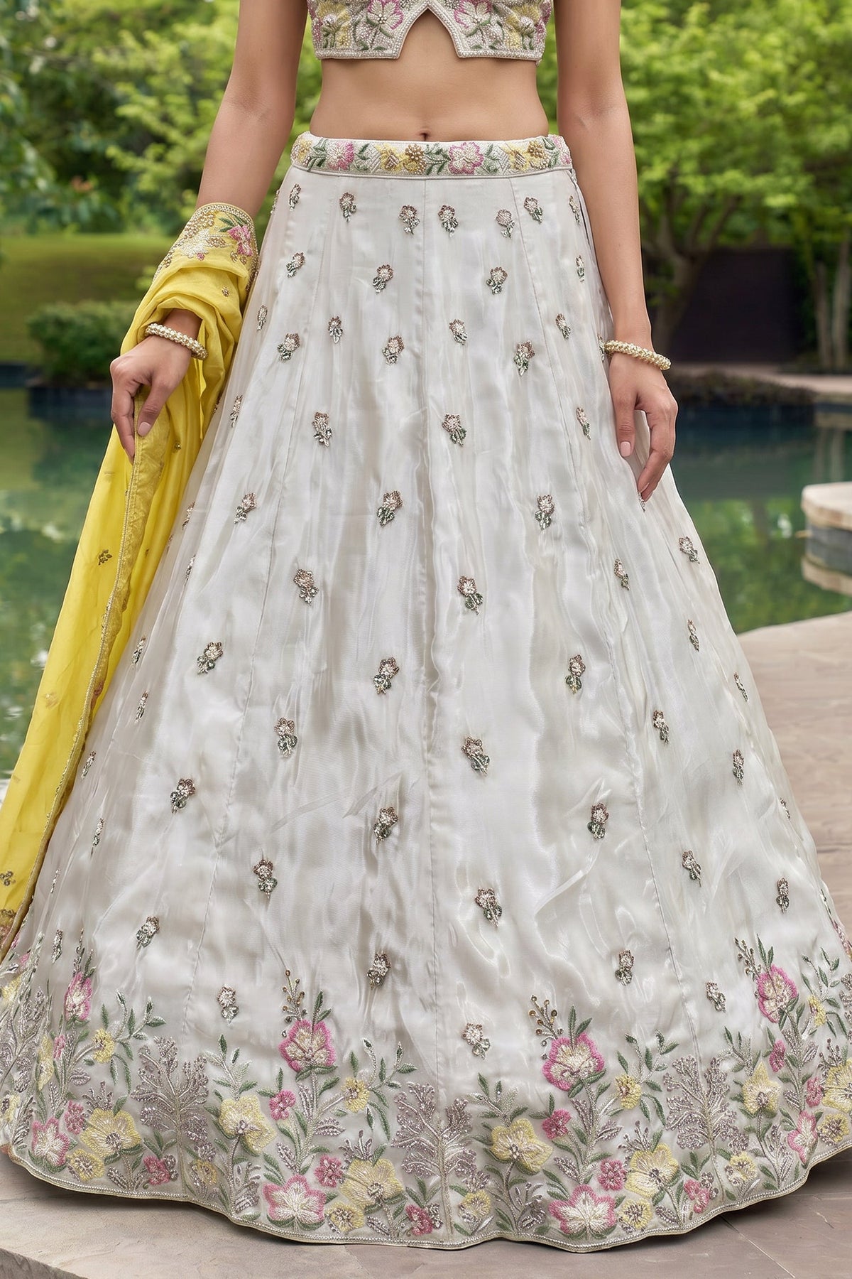 Off White Lehenga Choli with Floral Embroidered Border