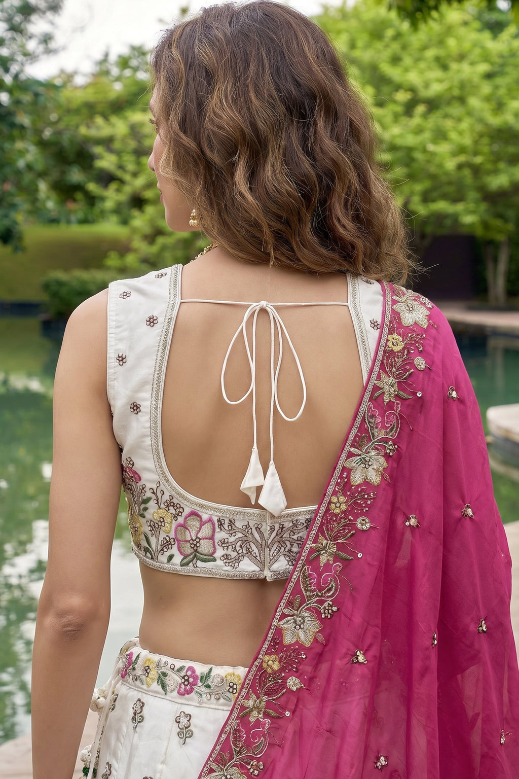Off White Lehenga Choli with Floral Embroidered Border