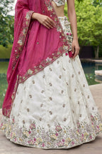 Off White Lehenga Choli with Floral Embroidered Border