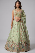 Pista Green Lehenga Choli with Peacock Floral Border