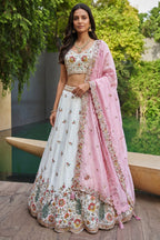 Off White Lehenga Choli with Peacock Floral Border