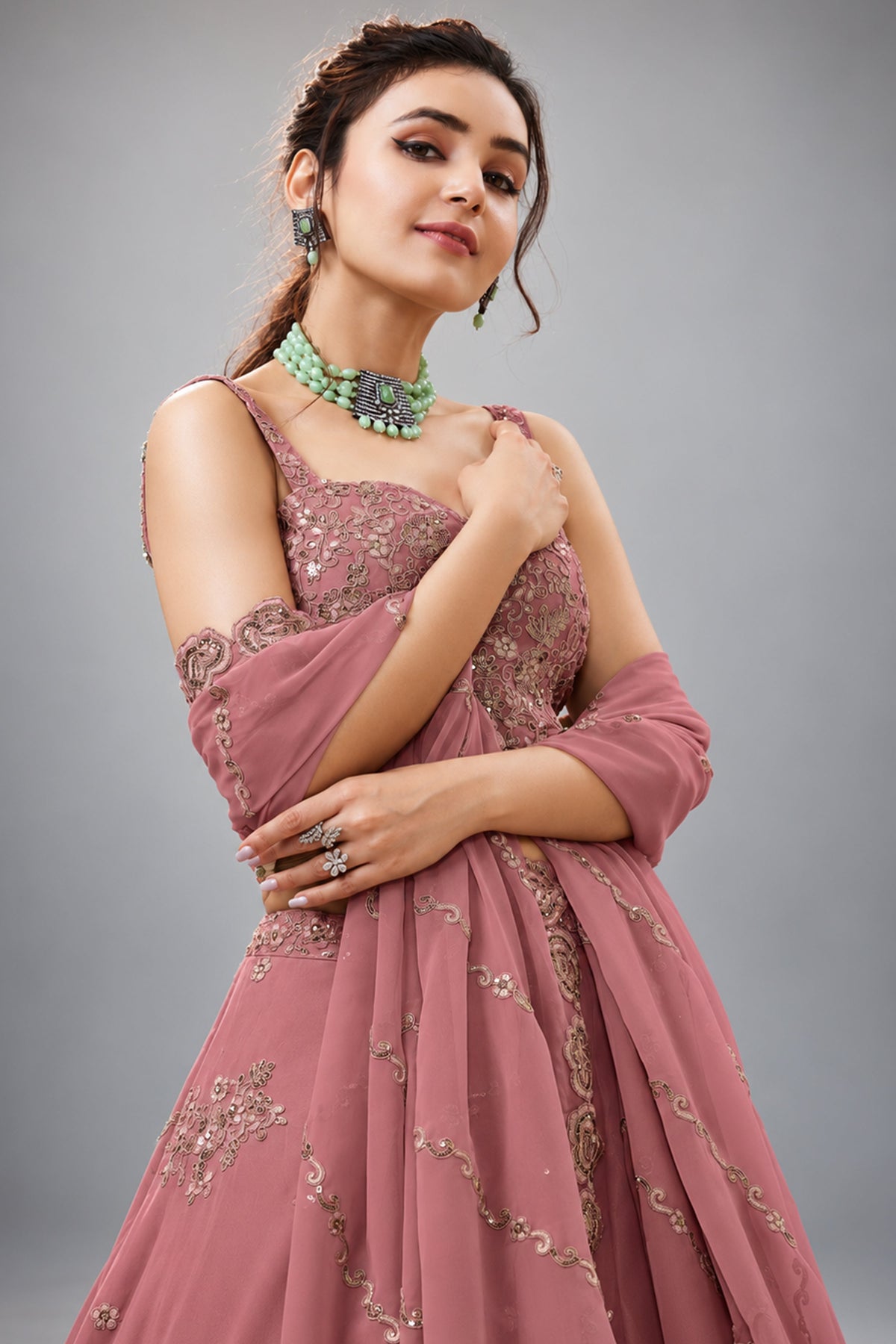 Peach Georgette Lehenga Choli featuring Intricate Zari, Sequins & Dori Work