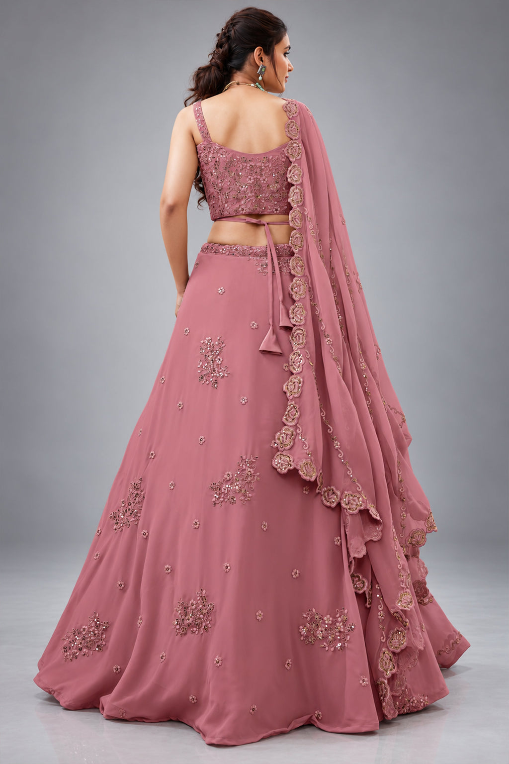Peach Georgette Lehenga Choli featuring Intricate Zari, Sequins & Dori Work