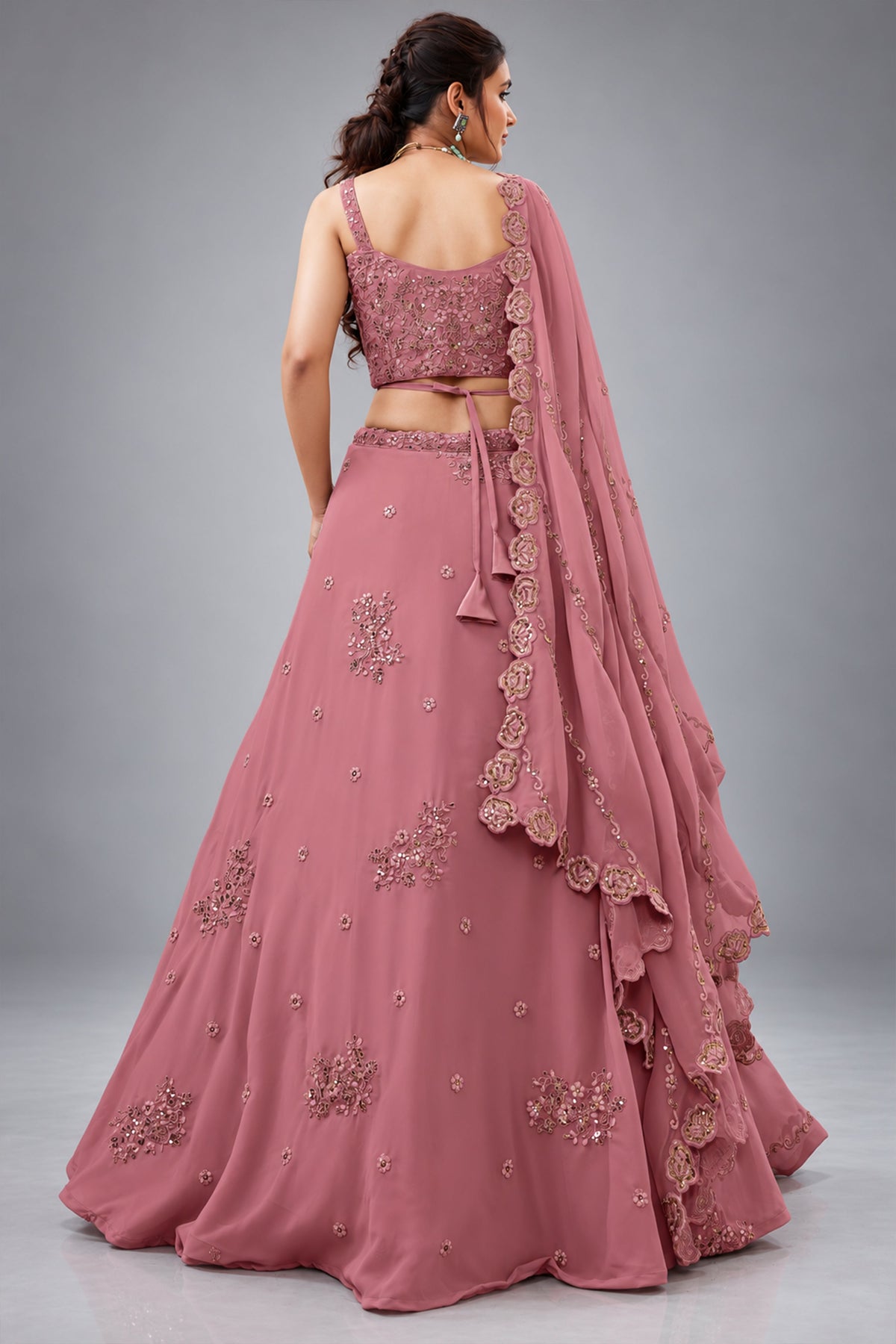 Peach Georgette Lehenga Choli featuring Intricate Zari, Sequins & Dori Work
