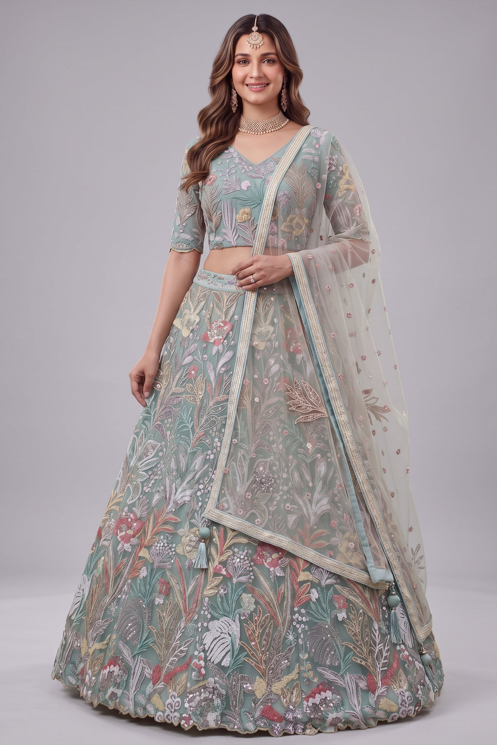 Ice Sky Blue Soft Net Lehenga Choli highlighted with Multi-Color Botanical Embroidery
