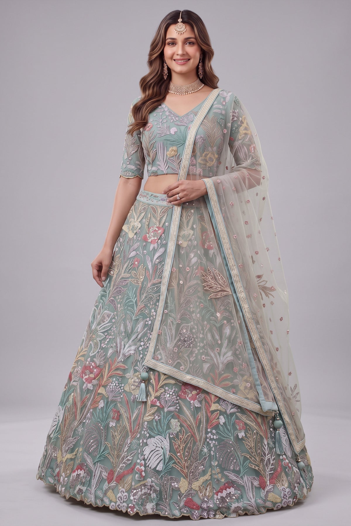 Ice Sky Blue Soft Net Lehenga Choli highlighted with Multi-Color Botanical Embroidery