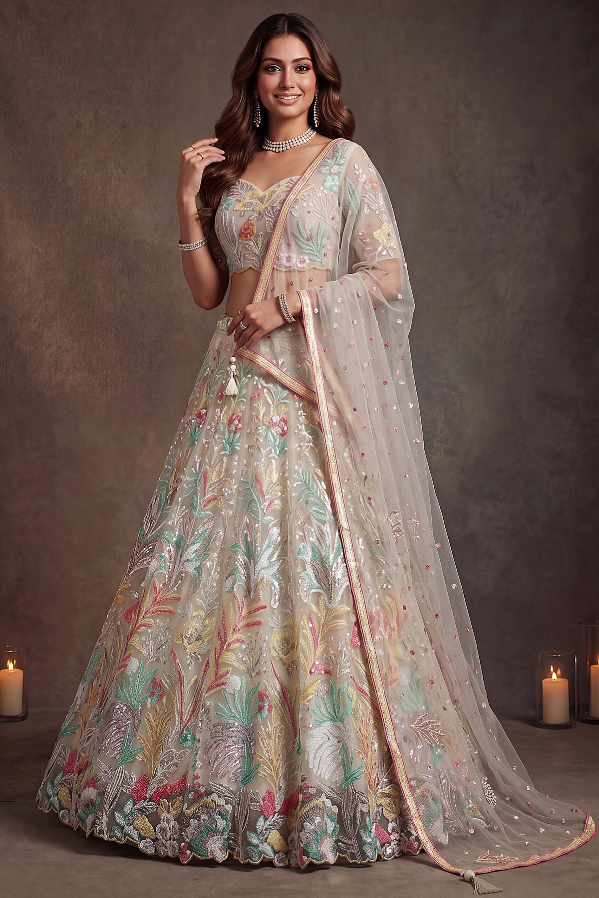 Pristine White Soft Net Lehenga Choli with Multi-Colored Floral Thread Embroidery