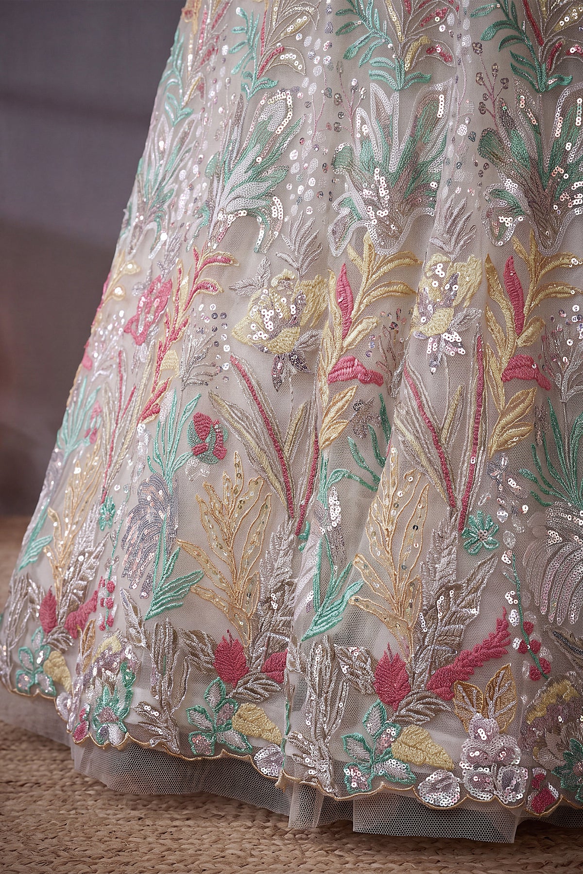 Pristine White Soft Net Lehenga Choli with Multi-Colored Floral Thread Embroidery