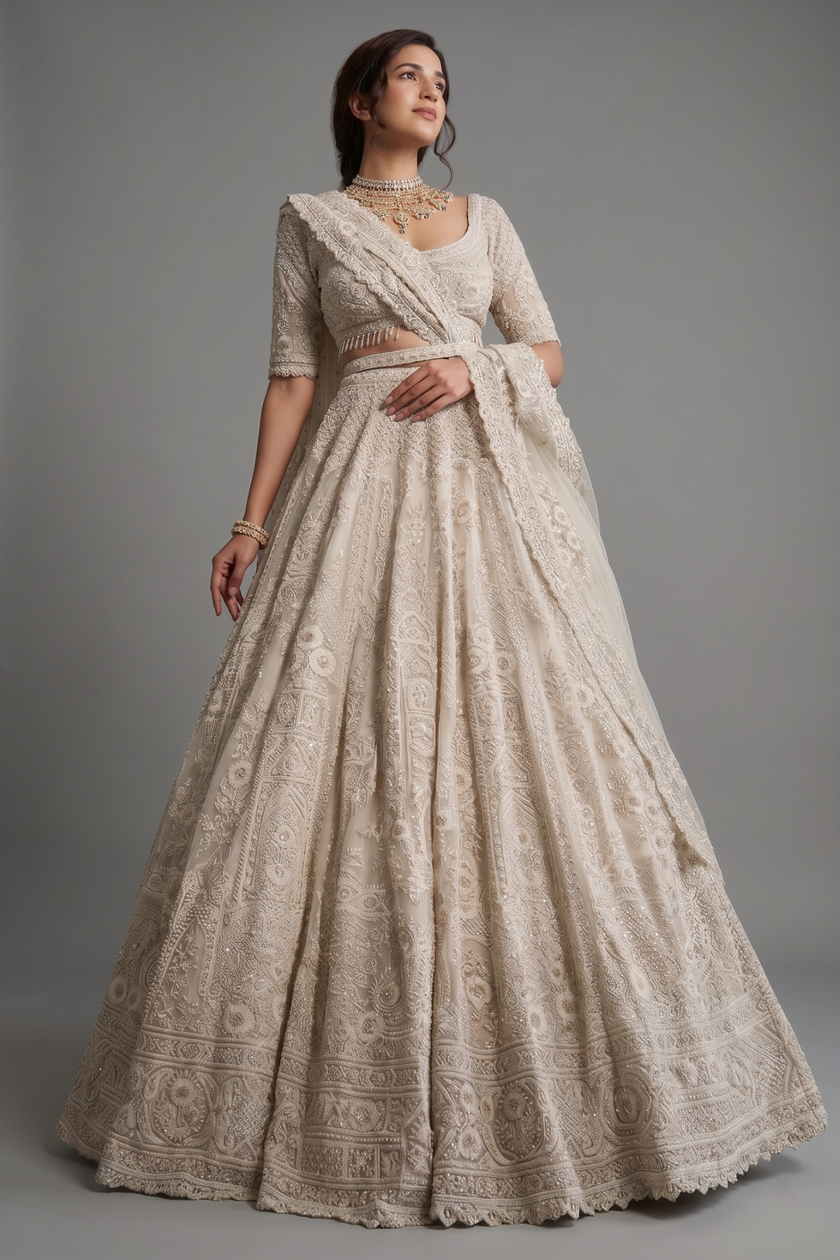 Off White Heavy Dori Embroidery Sequin Worked Lehenga in Net with Paisley and Floral Motifs