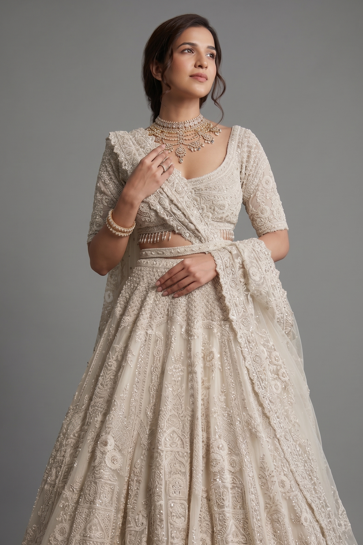 Off White Heavy Dori Embroidery Sequin Worked Lehenga in Net with Paisley and Floral Motifs