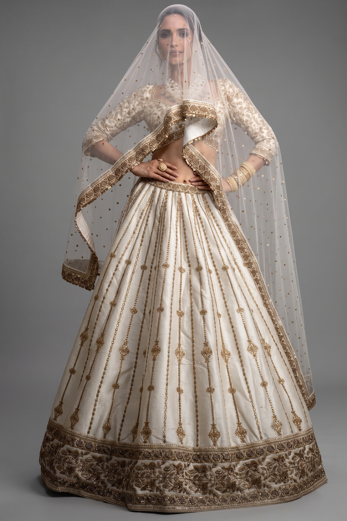 Cream Raw Silk Sequin Embroidered Designer Bridal Lehenga with Plunging Sweet Heart Neckline Blouse