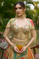Beige Tissue Floral Printed Lehenga with Embellished Corset and Cape Sleeve