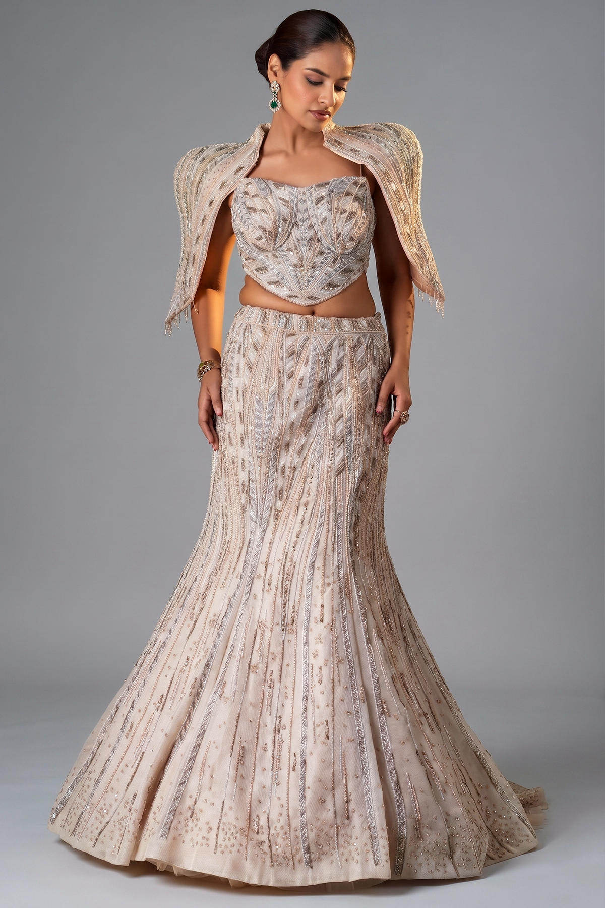 Blush Pink Net Mermaid Lehenga Set with Structured Corset Blouse and Embellished Shoulder Cape