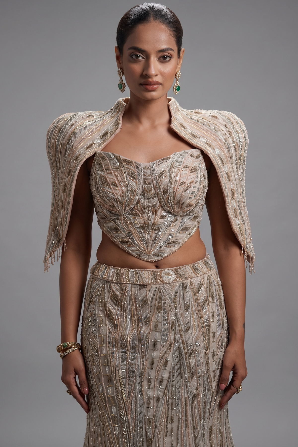 Blush Pink Net Mermaid Lehenga Set with Structured Corset Blouse and Embellished Shoulder Cape