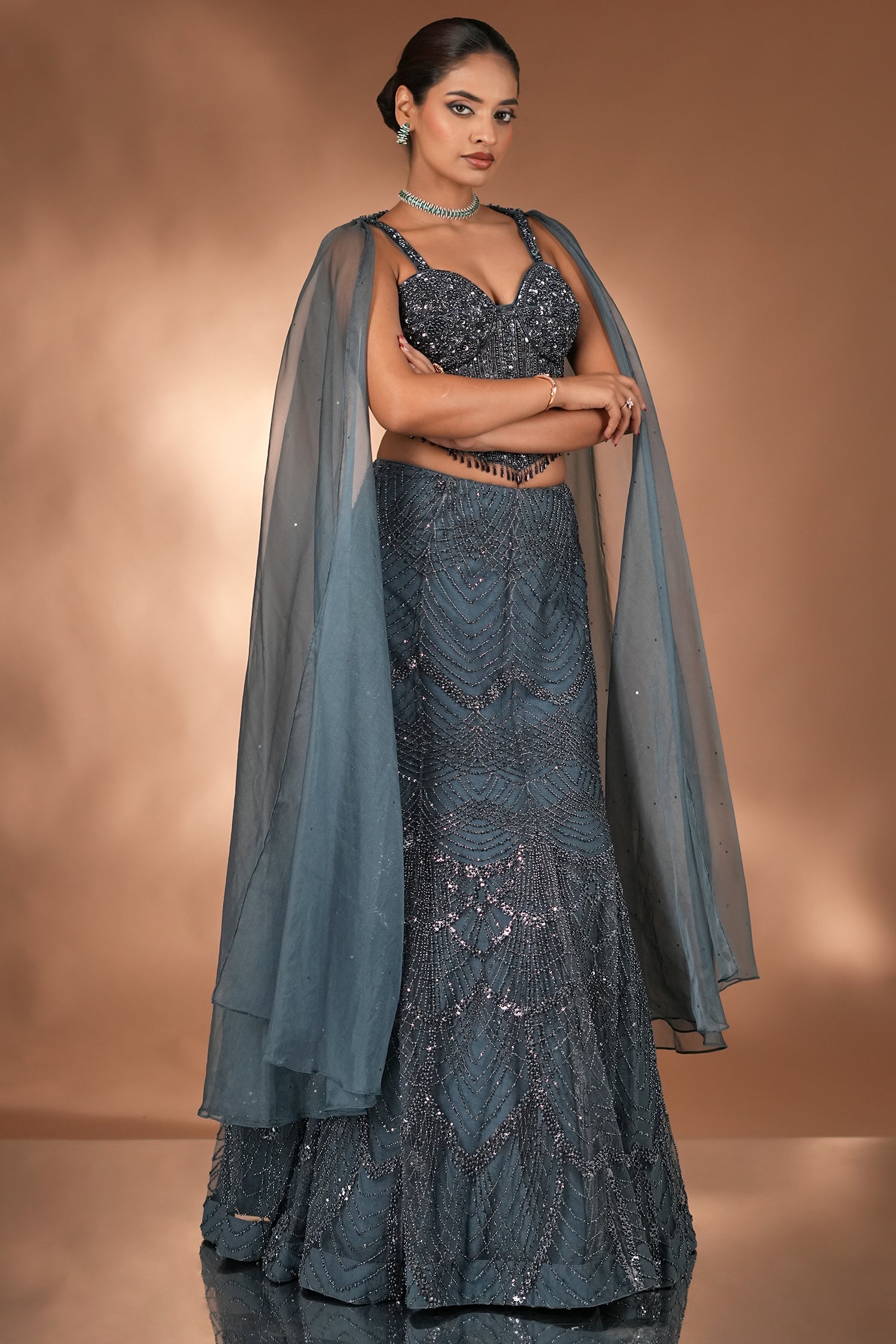 Prussian Blue Net Cutdana Beaded Mermaid Style Lehenga with Embellished Corset Blouse