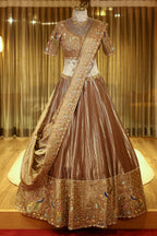 Chocolate Brown Munga Silk Woven Lehenga with Zardosi Beaded Work and Peacock Motif Broad Border