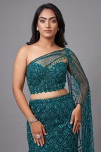 Teal Blue Net Embellishment Fish Cut Sequin Cutdana Work Lehenga with One Shoulder Cape Corset