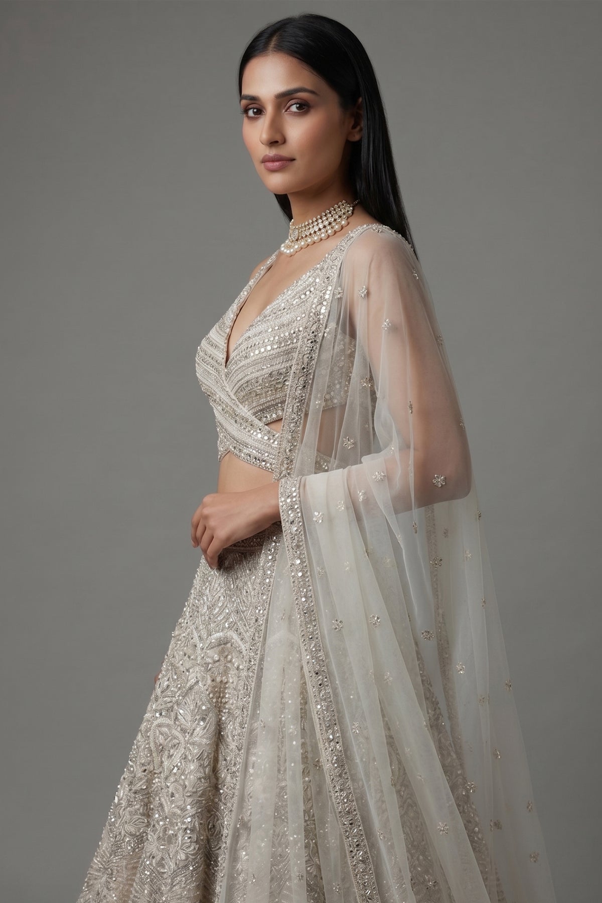Ivory White Net Cutdana and Sequin Work Designer Lehenga with Warp Style Blouse