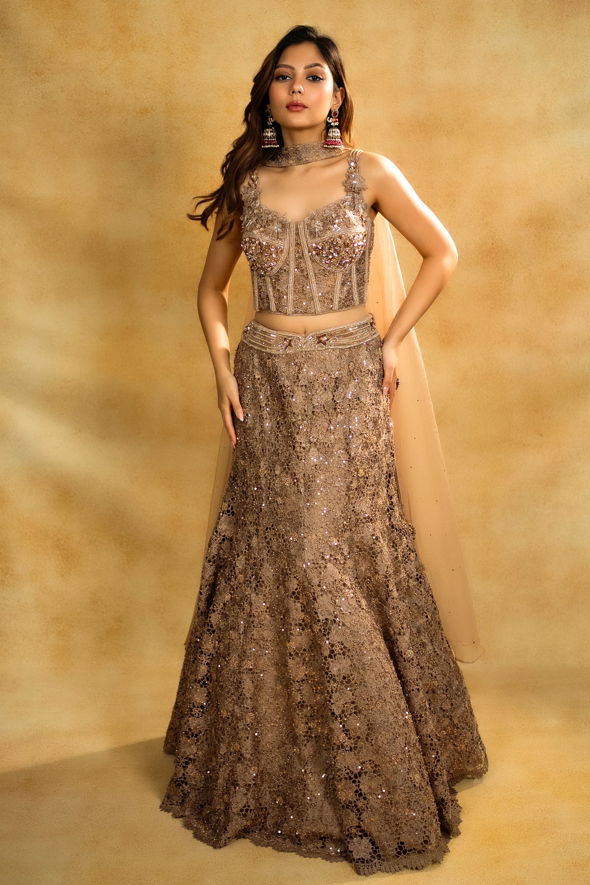 Rose Gold Net Sequinned Fish Cut Lehenga with Corset Blouse