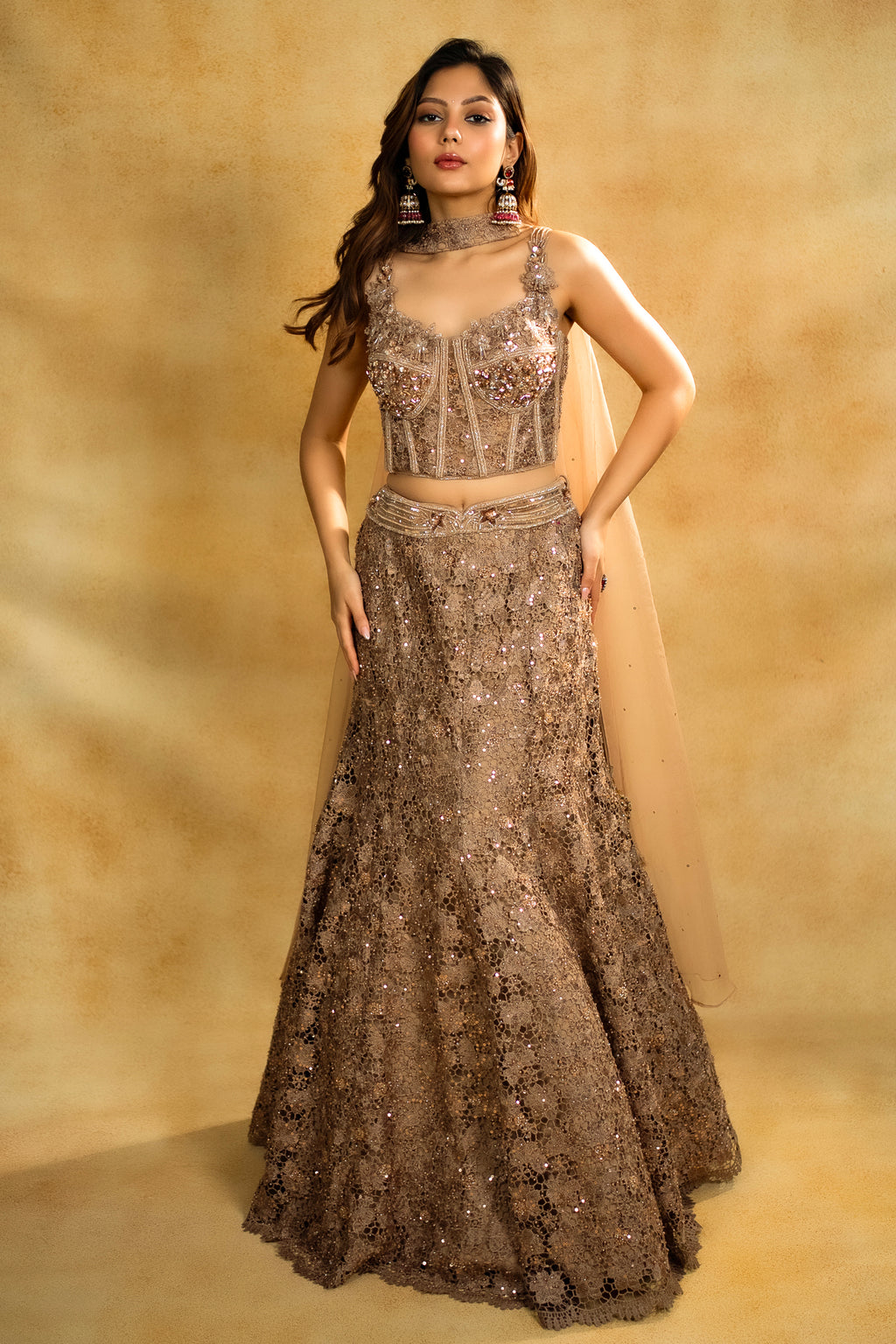 Rose Gold Net Sequinned Fish Cut Lehenga with Corset Blouse