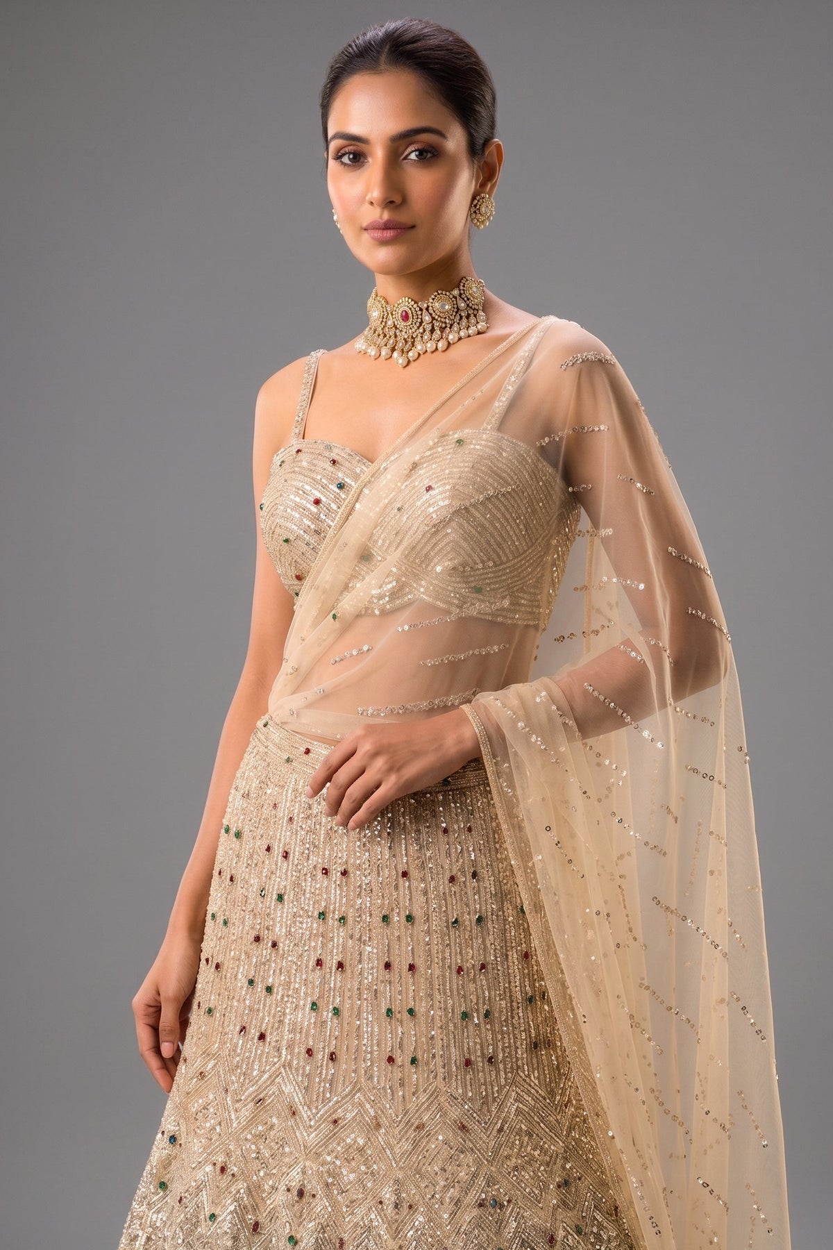 Champagne Gold Net Mermaid Lehenga with Attached Cape-Style Dupatta & Intricate Cutdana Work