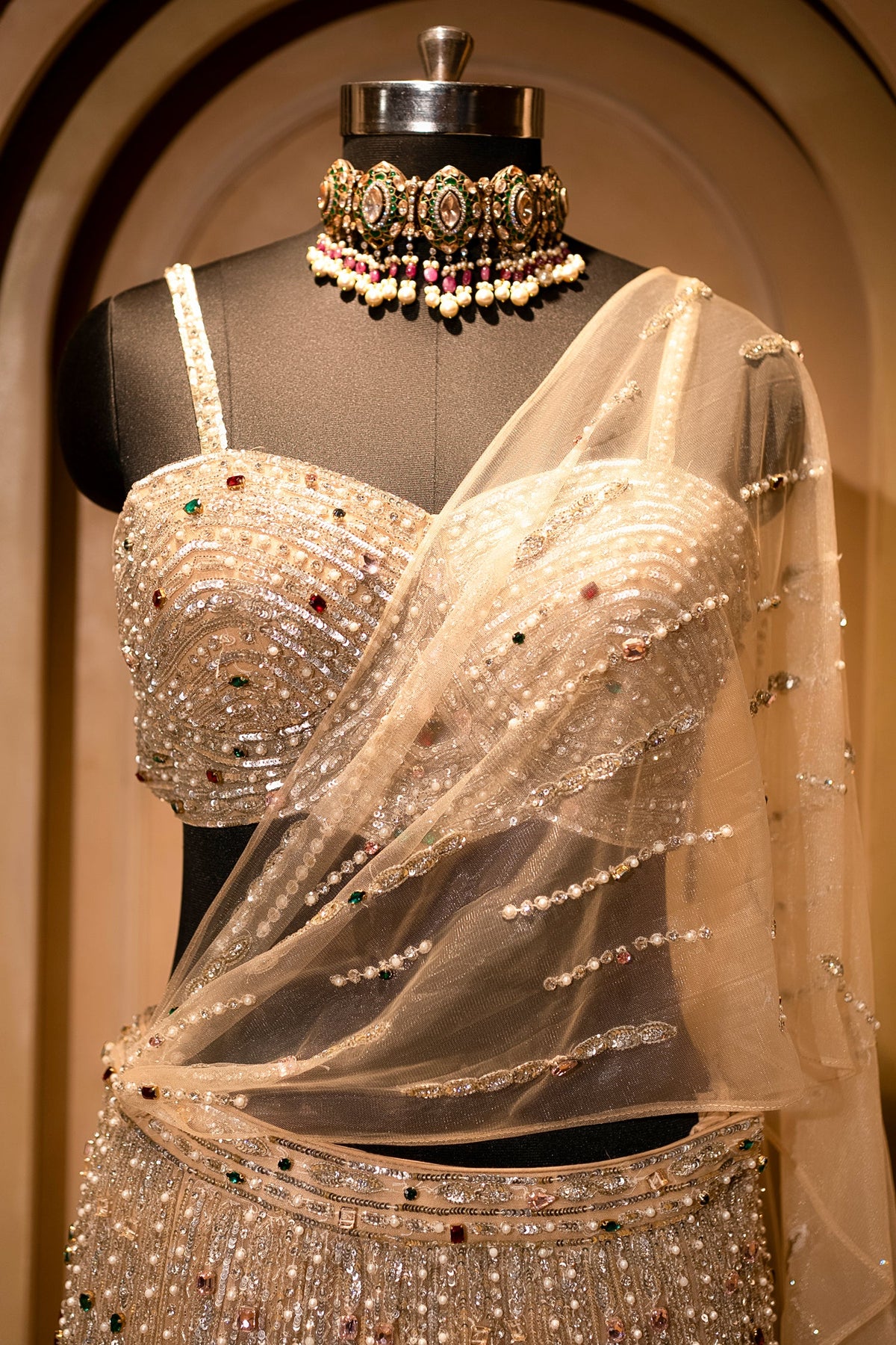 Champagne Gold Net Mermaid Lehenga with Attached Cape-Style Dupatta & Intricate Cutdana Work
