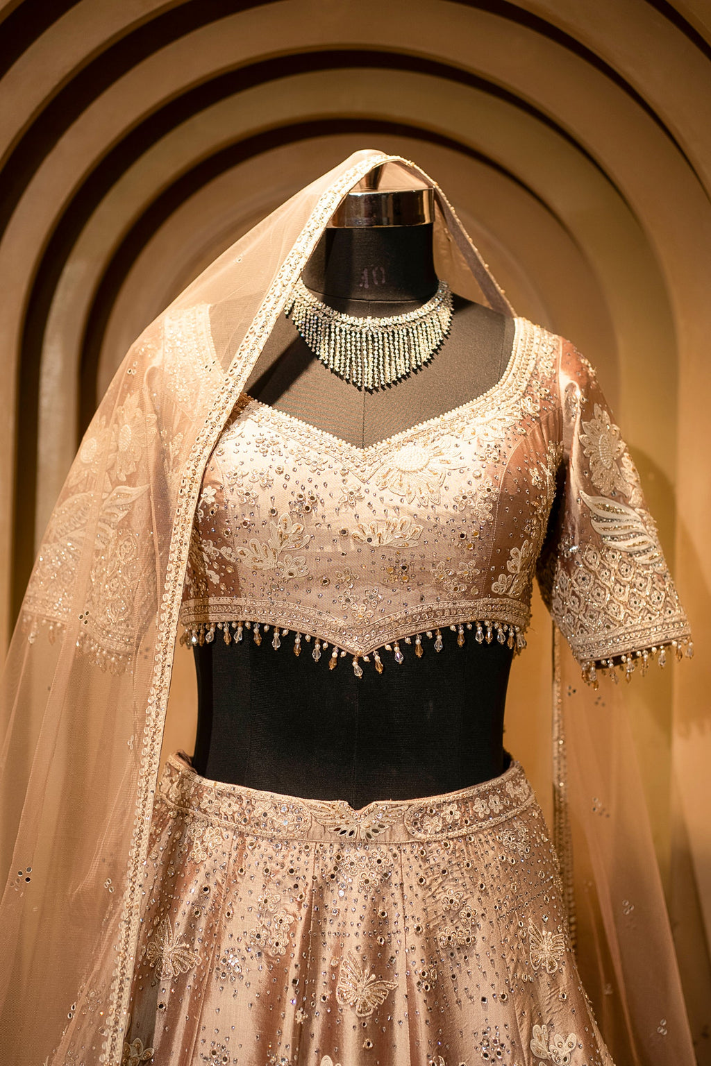Champagne Brown Silk Couture Lehenga with Architectural Border & Intricate Dori-Mirror Fusion