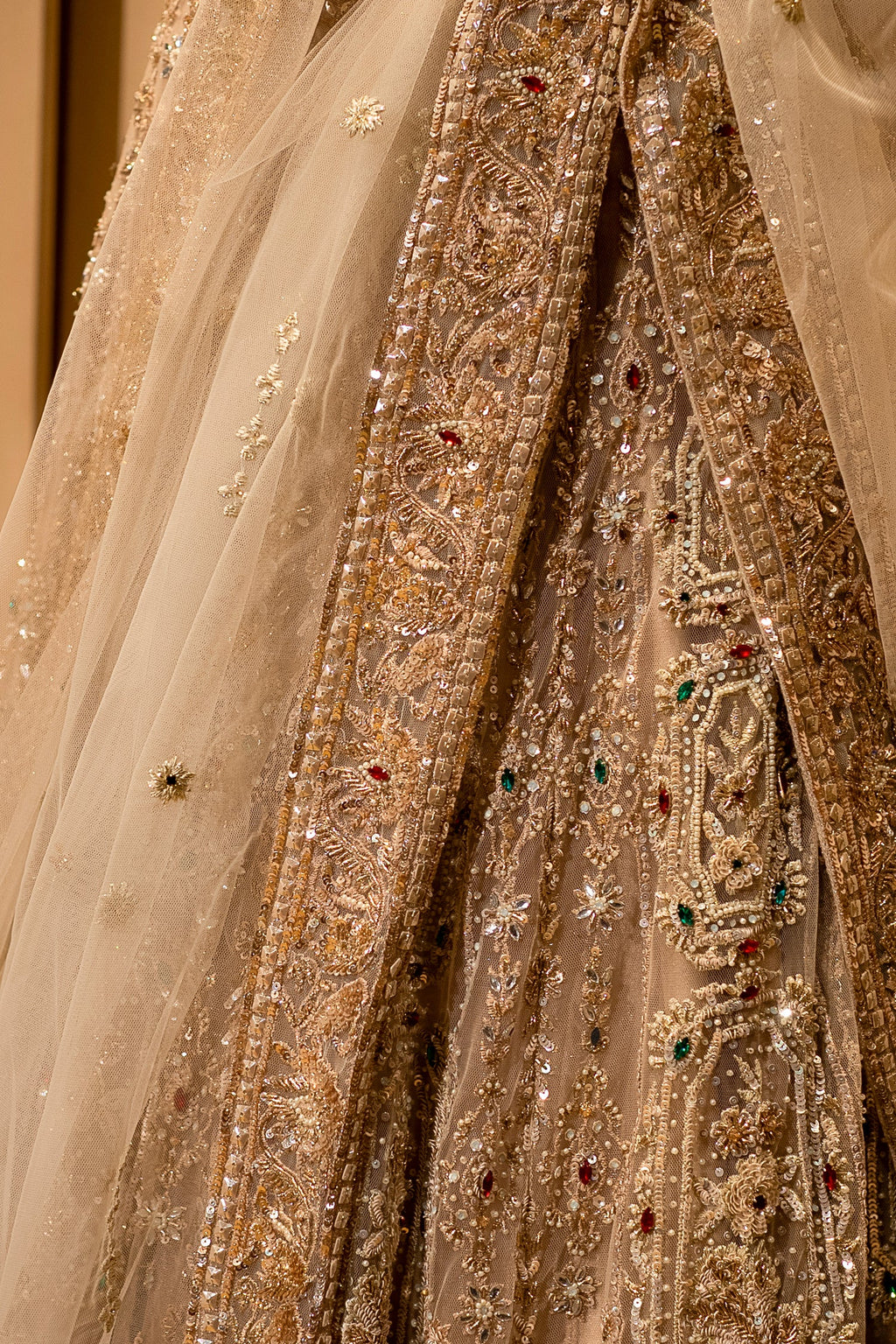 Royal Beige Net Bridal Lehenga with Luminescent Stone-Craft and Ethereal White Veil