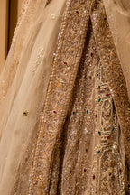 Royal Beige Net Bridal Lehenga with Luminescent Stone-Craft and Ethereal White Veil
