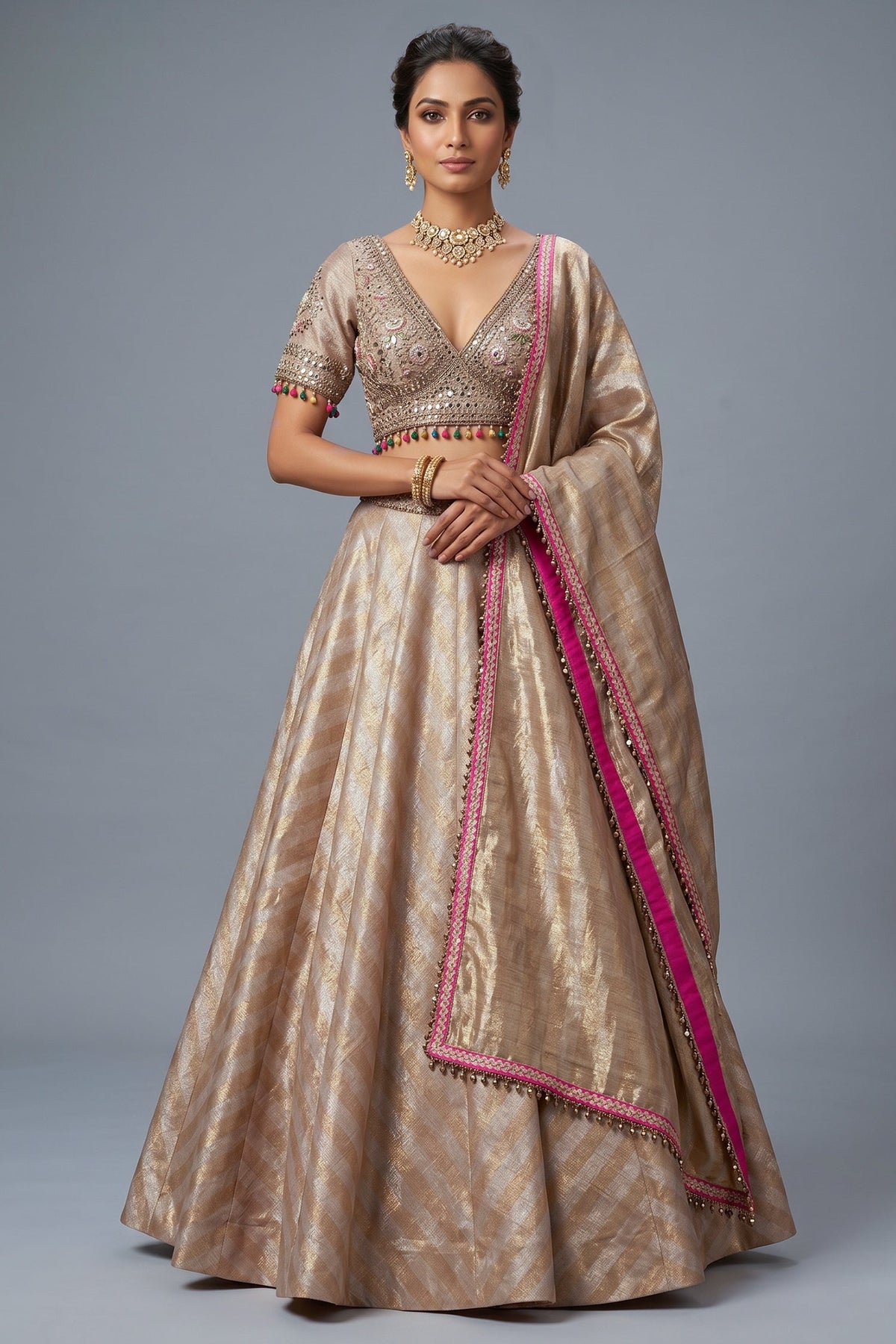 Golden Tissue Silk Lehenga with Kundan Worked Blouse