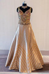 Golden Tissue Silk Lehenga with Kundan Worked Corset