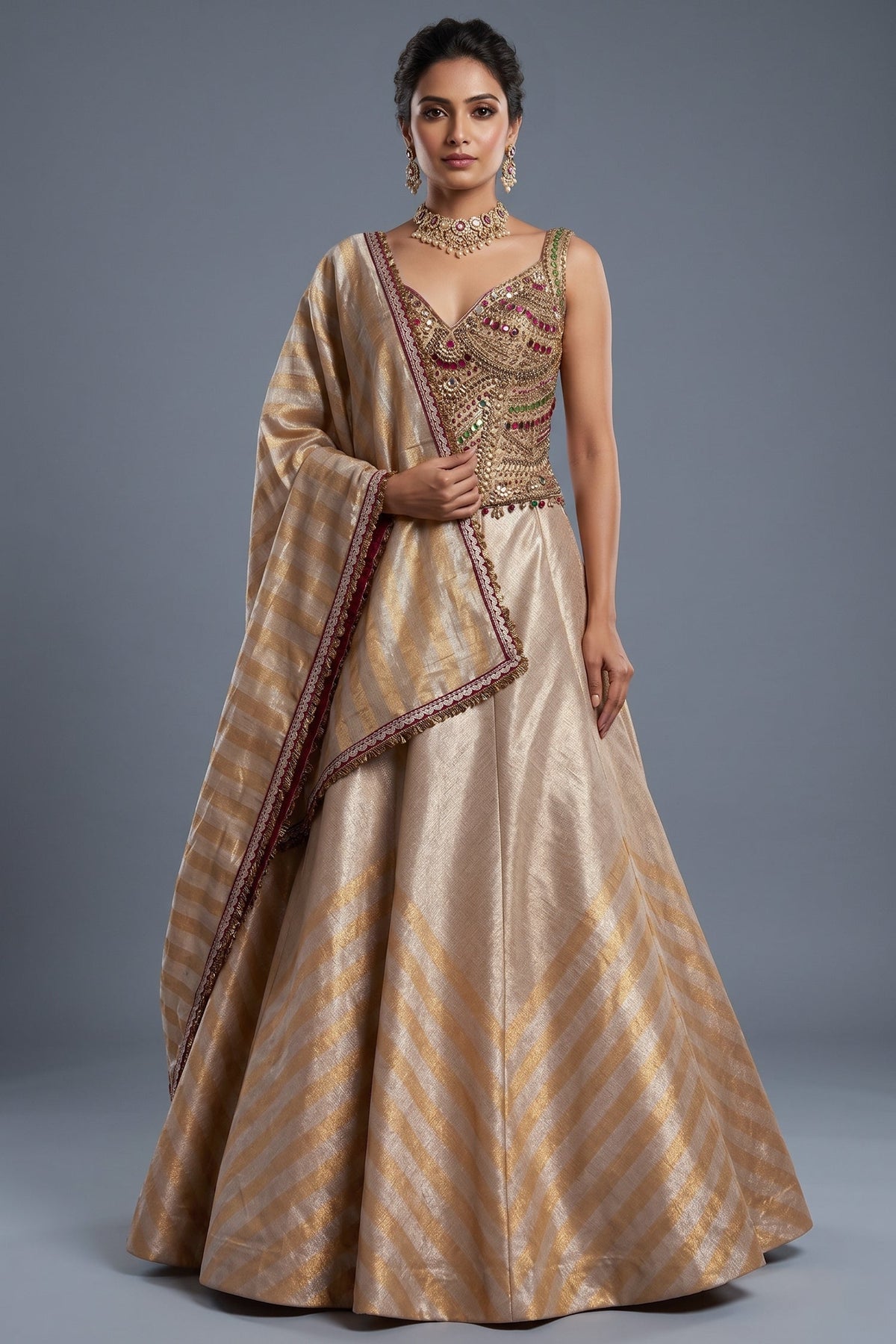 Golden Tissue Silk Lehenga with Kundan Worked Corset