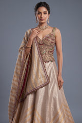 Golden Tissue Silk Lehenga with Kundan Worked Corset