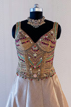 Golden Tissue Silk Lehenga with Kundan Worked Corset