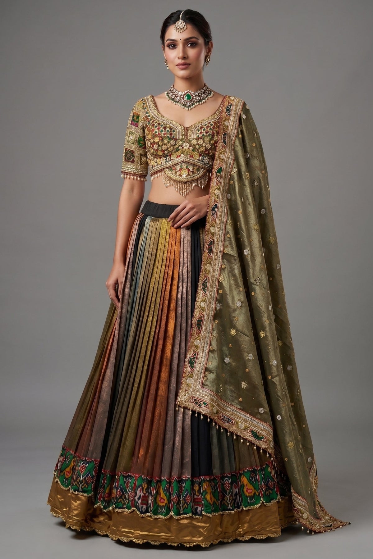 Sage Green Metallic Tissue Accordion Pleated Lehenga with Heritage Patola Weaving & Mirror-Work Blouse