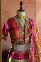 Cream and Fuchsia Two-Tone Tissue Silk Pleated Patola Ikkat Lehenga with Hand-Embellished Zardosi V-Neck Blouse