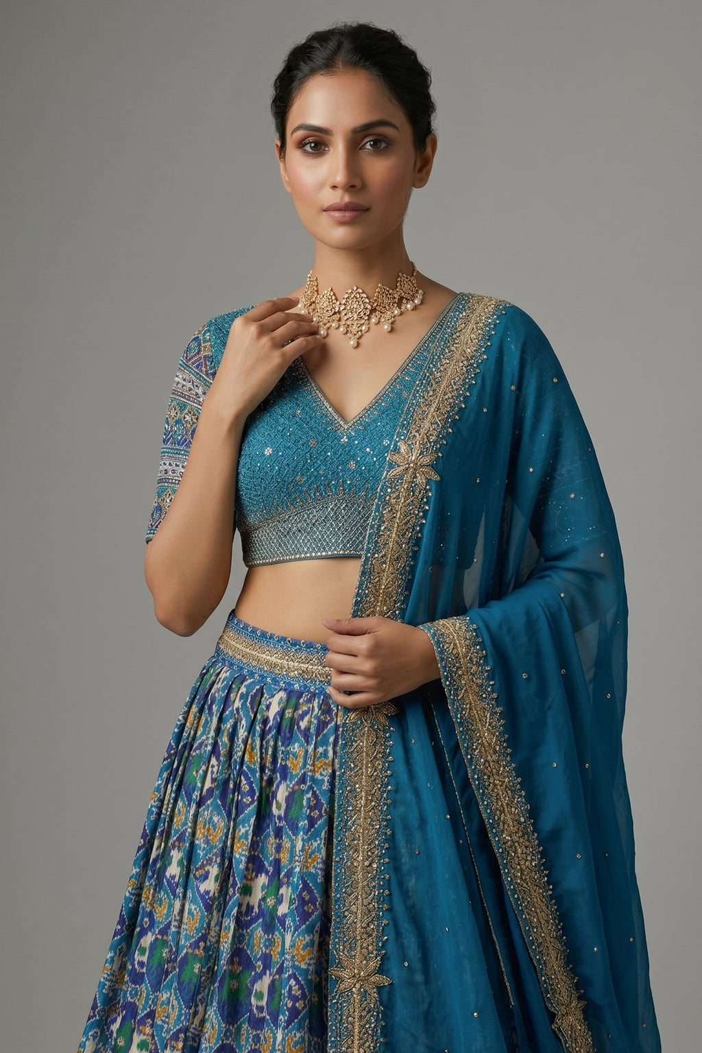 Sky Blue Silk Traditional Patola Lehenga with Hand-Embroidered Zardosi Blouse