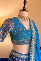 Sky Blue Silk Traditional Patola Lehenga with Hand-Embroidered Zardosi Blouse