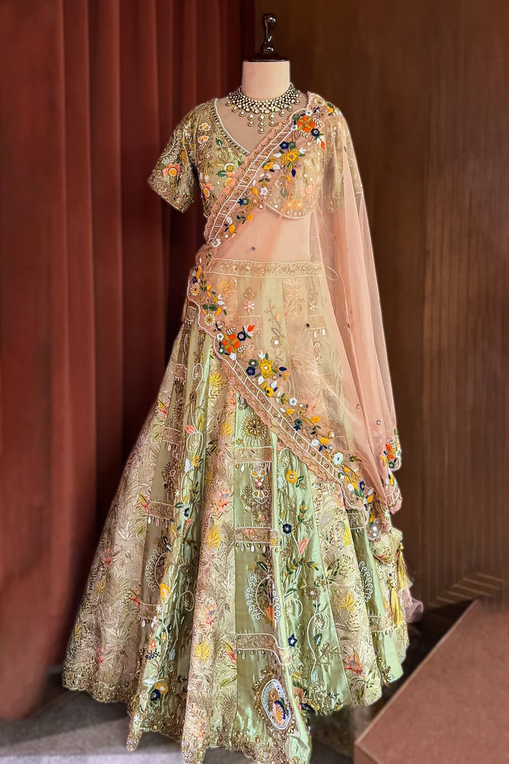 Mint Green Raw Silk Designer Lehenga with Multicolor Floral Hand-Embroidery